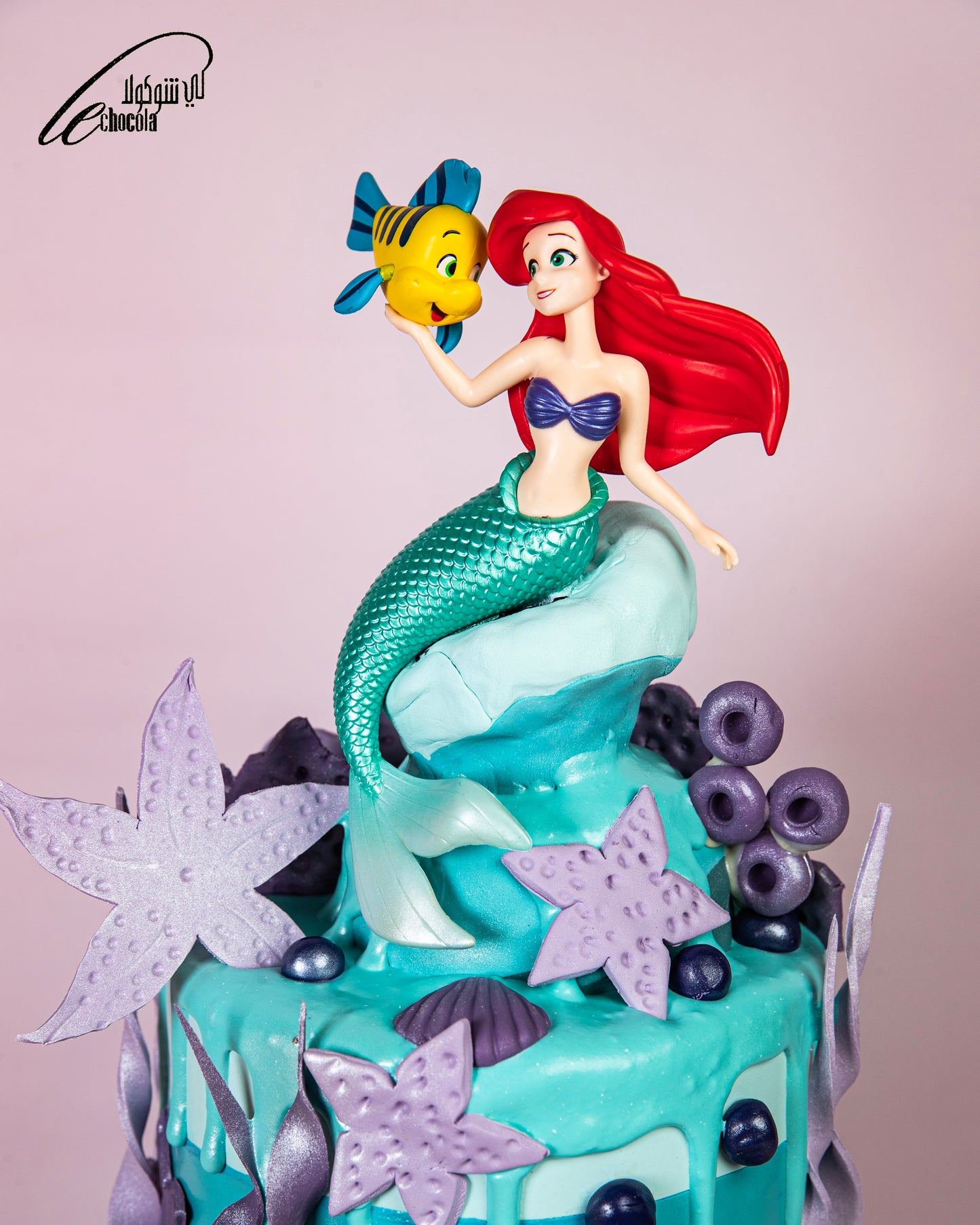 
                  
                    Mermaid Cake Design
                  
                