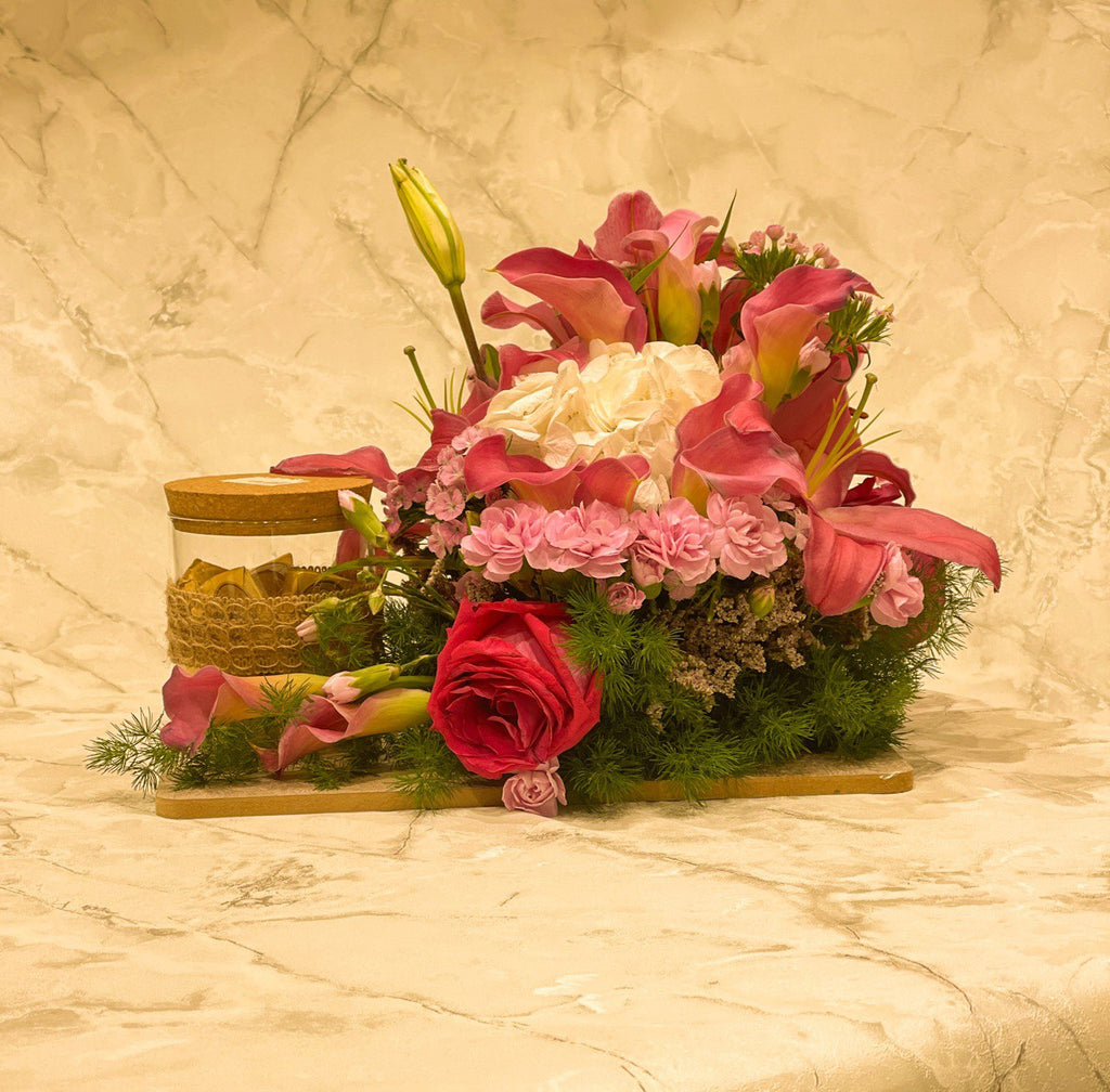 Le Chocola Special Gift chocolates mixed with roses fresh flowers online order free delivery